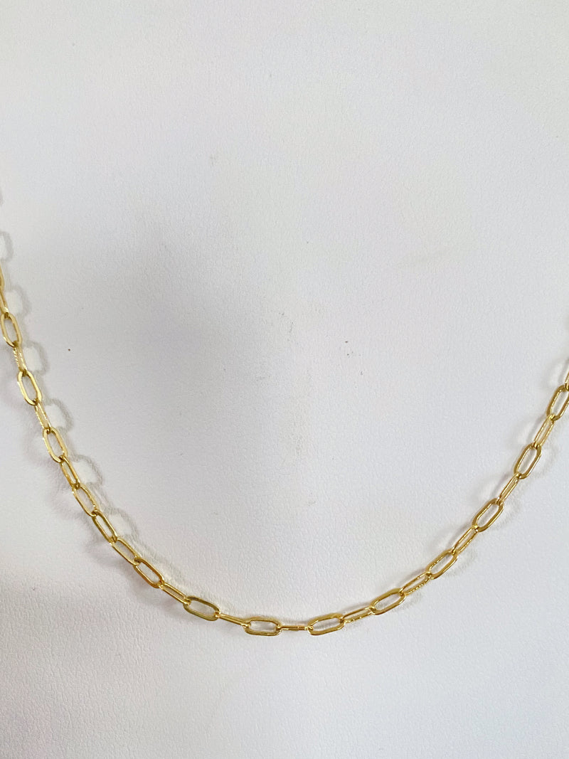 Mini Paperclip Chain Necklace-The perfect mini paperclip necklace! The mini paperclip style is adorable paired by itself as a great classic chain or paired with your favorite charm or initial charm.

-Cali Moon Boutique, Plainville Connecticut