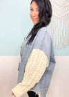 'This & That' Denim Shacket with Cable Sweater Sleeves-This shacket is the best of both worlds! A light wash denim body with cozy ivory cableknit sleeves. This neutral color combo will pair with other shades of denim, leggings and colored denim. A must have that will carry you through multiple seasons.-Cali Moon Boutique, Plainville Connecticut