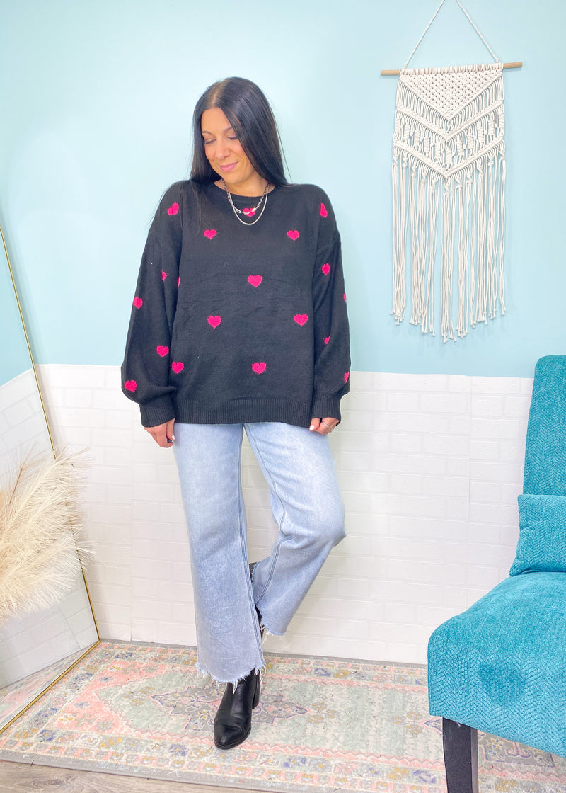 'All My Heart' Black Oversized Sweater with Hot Pink Mini Hearts-You will love the softness of this sweater with all your heart! It has tons of stretch with a&nbsp; soft "fluffy" sweater fabric and pops of hot pink hearts on front and back. Perfect for Valentine's Day or any day you need a warm sweater hug!-Cali Moon Boutique, Plainville Connecticut